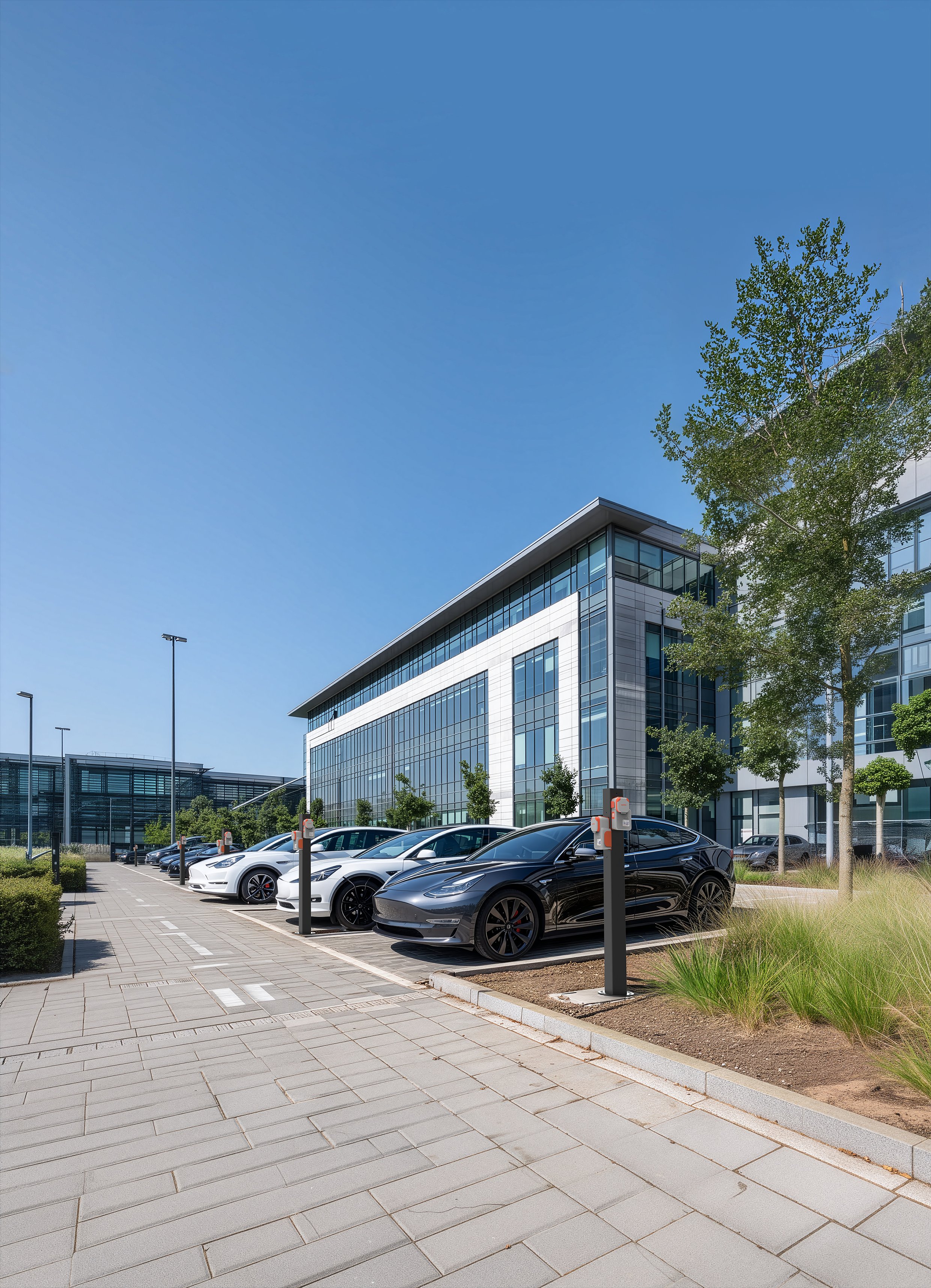 Parking d'entreprise équipé de bornes de recharge Sparklin conformes à la Loi LOM